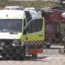A helicopter and ambulance involved in the rescue mission after the crash
