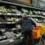 Shoppers in the fruit and vegetables section of a branch of Sainsbury’s in south London.