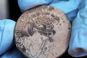 Time capsule that appeared to contain only silt yields centuries-old coins