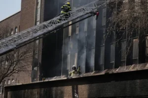At least 74 dead as fire rips through rundown building in South Africa