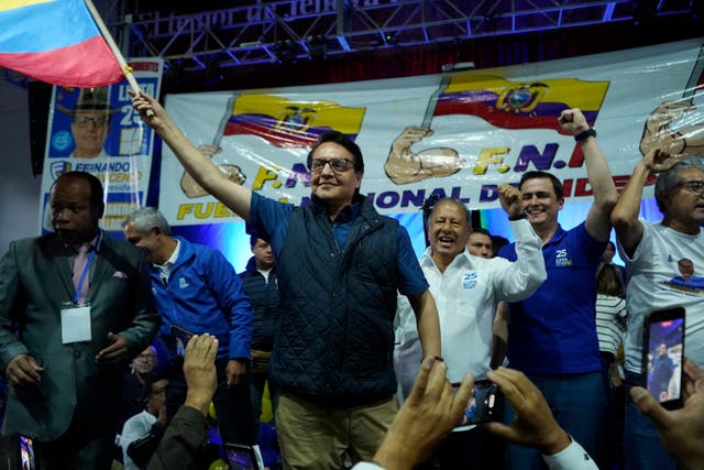 75f593b3ea30455cb0143cadd3889099-2 Mr Villavicencio moments before he was killed at a political rally in Quito