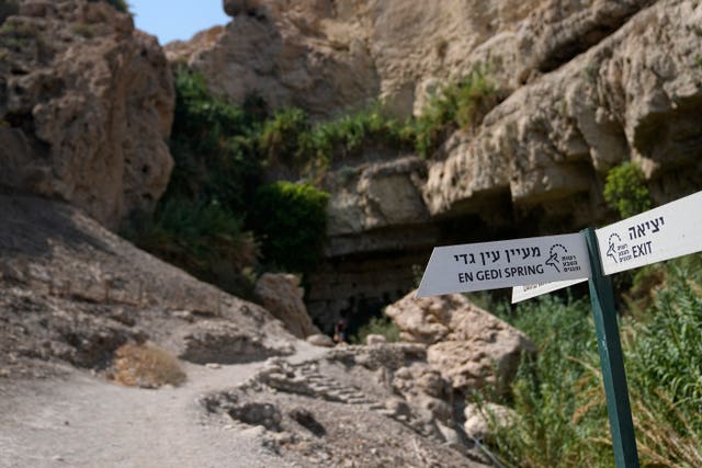 7fee5f7b17e041b189fde52988e15d07 Signs direct visitors to a spring near the site of a rockslide that took place in the Ein Gedi Nature Reserve, on the western shore of the Dead Sea, a popular tourist site in Israel