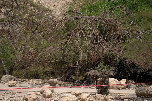 a3205dcba6a3404ca623b2ae0fafaf39 Crime scene tape blocks access to the site of a rockslide that took place in the Ein Gedi Nature Reserve, on the western shore of the Dead Sea, a popular tourist site in Israel