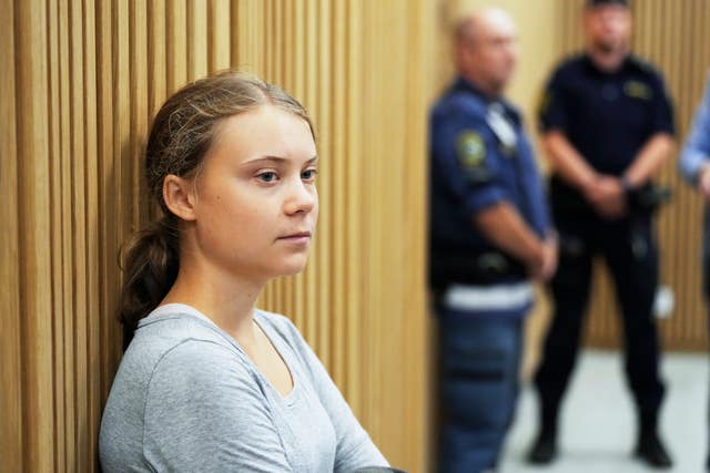 a449632d137448949f9e404c48db1d1a Climate activist Greta Thunberg of Sweden waits for her hearing