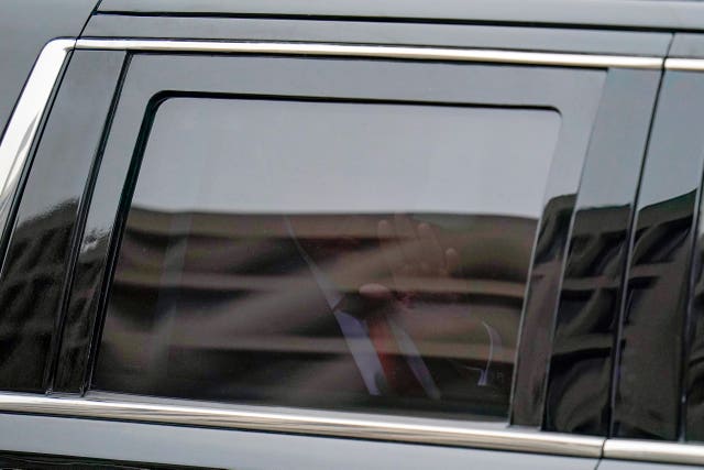 d3d8d67130f74938a501d481d62a8ef8 Mr Trump waves from his motorcade as he leaves the E Barrett Prettyman US Federal Courthouse