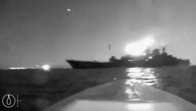 d5840b1c965047bb8e40f529f0c4835f-1 In this grab taken from video a drone manoeuvres as it approaches the vessel claimed to be a Russian large landing ship, the Olenegorsky Gonyak, close to the Black Sea port of Novorossiysk