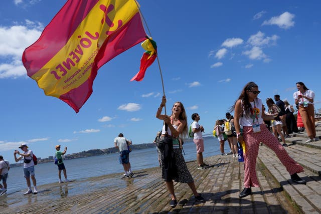 e8525b1abfd0426aae43a34e97c182fb Pilgrim in the water waves a Spanish flag