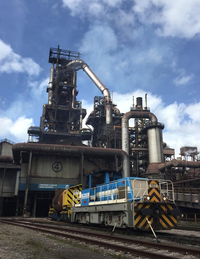 2-26232225 A train goes into a blast furnace at Port Talbot steelworks