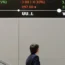 London's FTSE 100 slips into the red