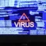 A stock image of a laptop screen showing a computer virus warning