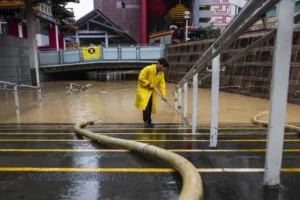 Two dead amid extreme rain and flash flooding in Hong Kong