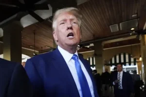 Prosecutor says ‘fairness’ behind decision to lump Trump in mass criminal trial