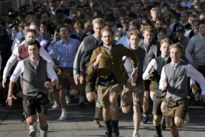 Beer flows and crowds descend on Munich for the official start of Oktoberfest