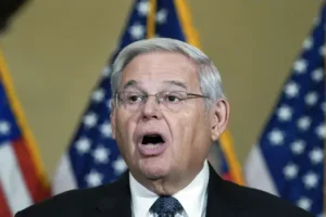 US senator faces bribery charges after gold bars and cash found hidden in home