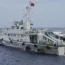 A Chinese coastguard ship tries to block the way of a Philippine supply boat, left, as it heads towards Second Thomas Shoal, locally known as Ayungin Shoal, in August