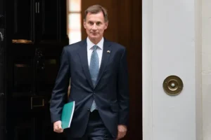 UK must end ‘vicious circle of ever-rising tax rises’, Hunt says, as he calls for ‘carrot and stick’ welfare reform