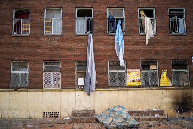 e09dde8c92834c4899fbf095cf51b07a People used curtains and sheets to try and flee the fire