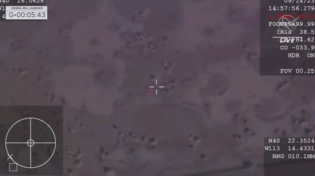 f2a7fc99f0d84168988b557e688087f0 The capsule after landing on Earth in the Utah desert