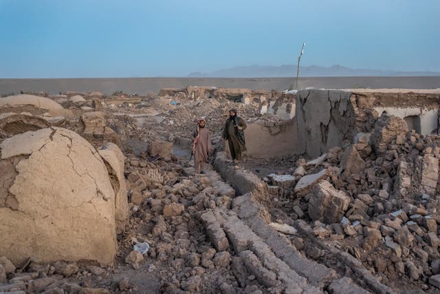 28a079110a064e42a6de0989d9fcae2f Taliban fighters guard the site of an earthquake in Zenda Jan district in Herat province