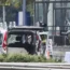 A bomb disposal expert works next to a car after the explosion in Ankara on Sunday