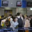 Passengers wait in a queue for a flight to Israel at the Eleftherios Venizelos International Airport in Athens, Greece
