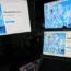 Computer monitors and a laptop display the X, formerly known as Twitter, sign-in page