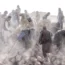 Volunteers clean up rubble after the earthquake in western Afghanistan