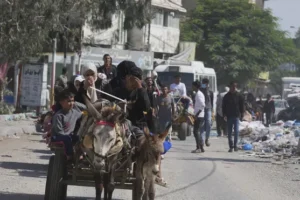 Palestinians flee as Israel orders evacuation and stages brief Gaza incursions
