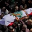 Retuers videographer's body carried