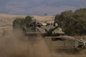 Airport in Syria targeted as Israel warns of offensive