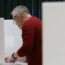 Voter casts ballot