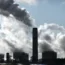 Smoke rising out of chimneys at a power station
