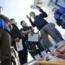 A team of experts from the International Atomic Energy Agency with scientists from China, South Korea and Canada observe the inshore fish during a morning auction at Hisanohama Port in Iwaki, northeas