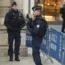 Police officers patrol during the funeral ceremony of French teacher Dominique Bernard, 57, who was stabbed to death at the school by a suspected Islamist extremist, in Arras, northern France, on Thur