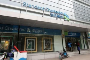 Standard Chartered shares tumble after profits hit by China charges