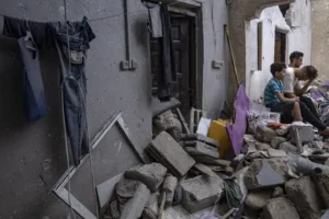 Gaza receives aid shipment as deaths top 8,000 and Israel widens offensive