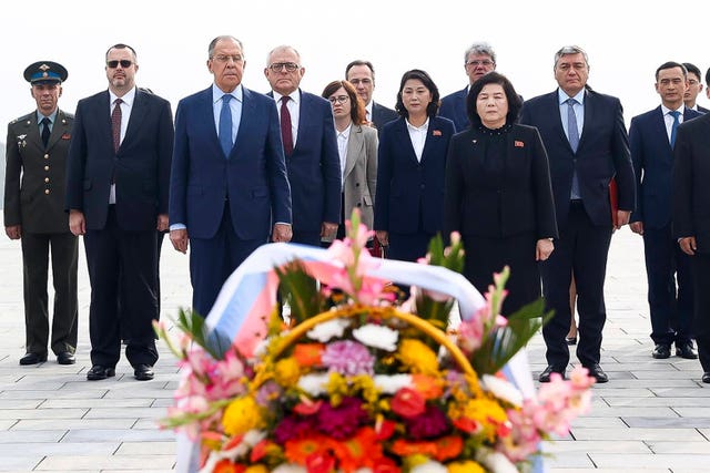 68ba7aef93574ec0b6c07e69536a9001 Russian foreign minister Sergei Lavrov, foreground left, and North Korean foreign minister Choe Son Hui, foreground right, attend a laying ceremony at the base of the bronze statues of North Korean late leaders Kim Il Sung and Kim Jong Il at Mansu Hill Grand Monument in Pyongyang, North Korea, on Thursday
