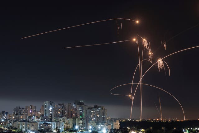 7825bd9c10fb4daebe40196bcc90eb4e Israel’s Iron Dome missile defence system fires interceptors at rockets launched from the Gaza Strip