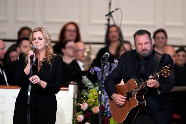 32d795093f934b1180688db6da7c427e Garth Brooks and Trisha Yearwood perform Imagine at a tribute service for former first lady Rosalynn Carter at Glenn Memorial Church at Emory University in Atlanta