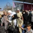 People walk through a gate to enter the Rafah border crossing to Egypt in the southern Gaza Strip