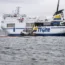 The grounded ferry Marco Polo and the tug Max are seen outside Horvik, southern Sweden