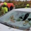 A car windshield destroyed as the result of storm damage