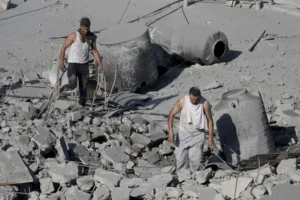 Israeli strikes kill multiple civilians at shelters in Gaza combat zone