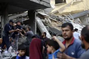 Israel severs Gaza in two as Palestinian death toll ‘passes 10,000 mark’