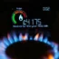 A handheld smart meter on a kitchen hob showing the cost of a year-to-date’s worth of home energy usage.