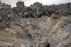 Fighting rages near Gaza hospital as people trapped inside say they cannot flee