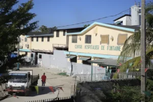 Hospital director in Haiti says gang stormed in and took hundreds hostage