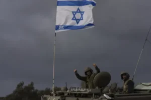 Israeli troops battle Hamas fighters in packed refugee camp