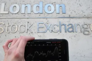 UK stock markets languish after Bank chief tempers hopes of inflation fall