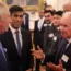 The King and Prime Minister Rishi Sunak meet guests during a reception at Buckingham Palace